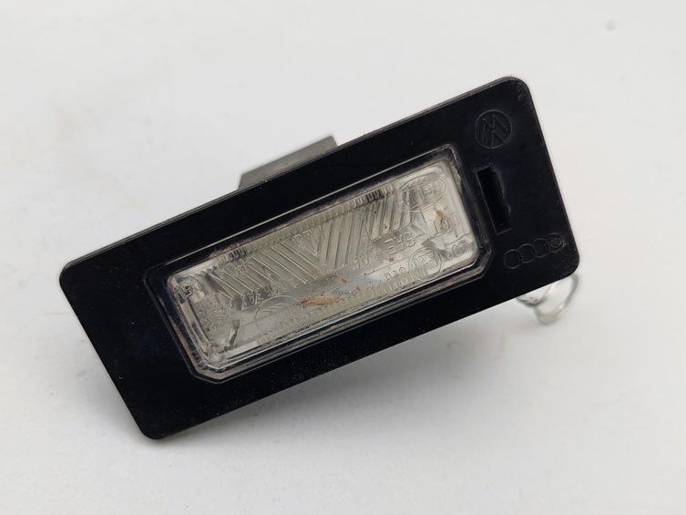 подсветка номера Volkswagen Passat B6 2008, 2.0 л., дизель, МКПП, синий, универсал, 8T0943021