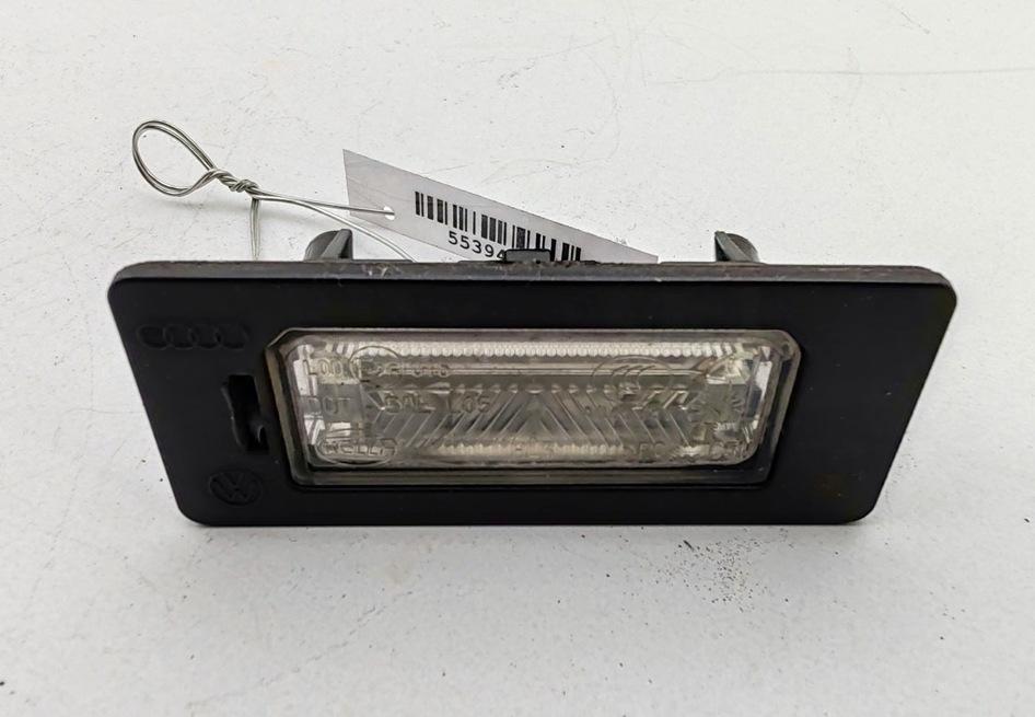 подсветка номера Volkswagen Passat B6 2008, 2.0 л., дизель, МКПП, синий, универсал, 8T0943021