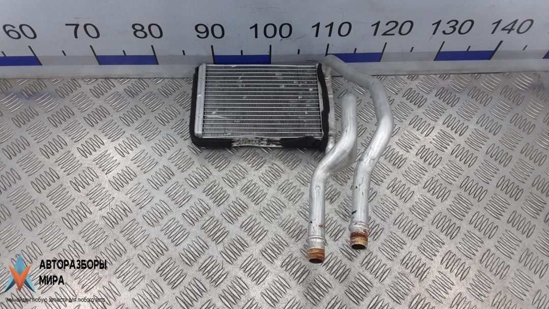 радиатор отопителя (печки) Ford Fiesta 5 поколение 2002, 1.3 л., бензин, МКПП, хетчбэк 5 дв., DD1061A10, 2S6H18B539AB, 1206926 - фото №1