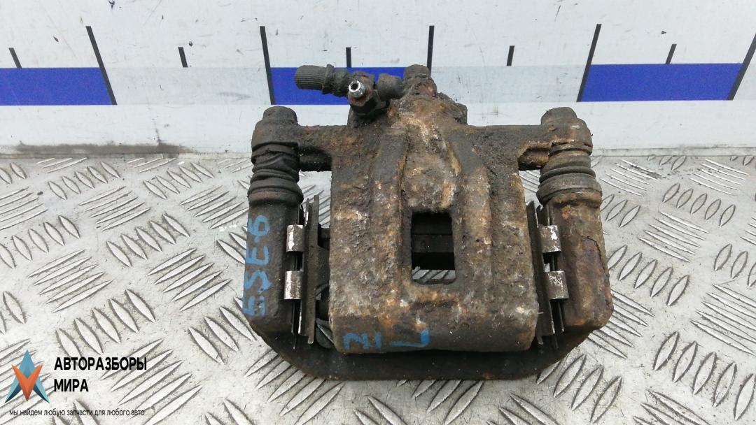 суппорт задний левый Chevrolet Nubira 1 поколение 2006, 1.6 л., бензин, МКПП, универсал, 96463798 - фото №1