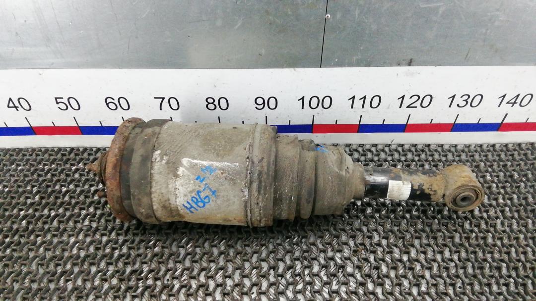 амортизатор задний левый Land Rover Discovery 3 поколение 2007, 2.7 л., TD V6, дизель, МКПП, внедорожник 5 дв. - фото №1