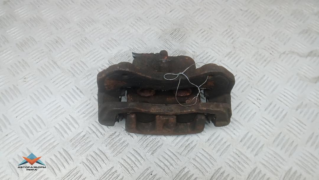 суппорт передний левый Peugeot 4007 1 поколение 2009, 2.2 л., дизель, МКПП, внедорожник 5 дв. - фото №1