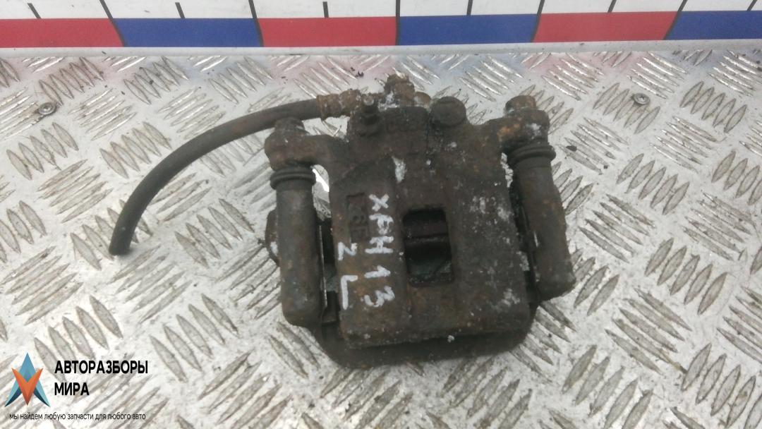 суппорт задний левый Nissan X-Trail T31 2007, 2.0 л., дизель, АКПП, универсал - фото №1