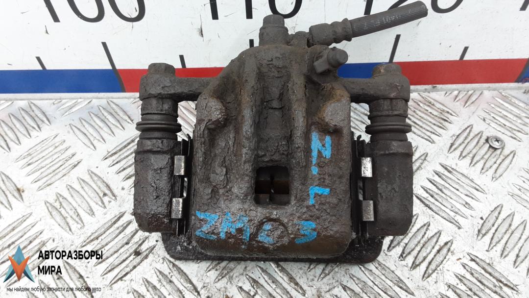 суппорт задний левый Hyundai Tucson 1 поколение 2005, 2.0 л., дизель, МКПП, внедорожник 5 дв., 583102EA10, 582102E300 - фото №1