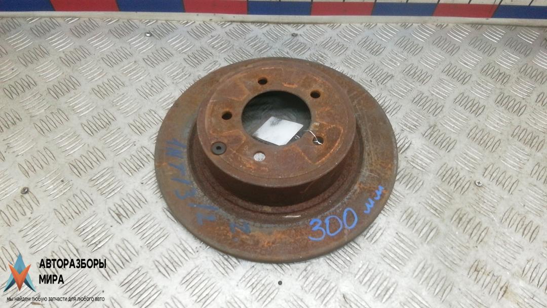 диск тормозной задний Dodge Caliber 1 поколение 2008, 2.0 л., бензин, вариатор, хетчбэк 5 дв. - фото №1