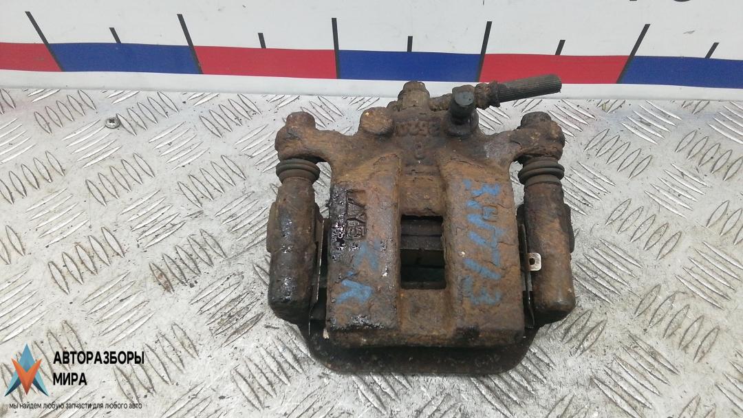 суппорт задний правый Nissan X-Trail T31 2008, 2.0 л., дизель, МКПП, внедорожник 5 дв. - фото №1