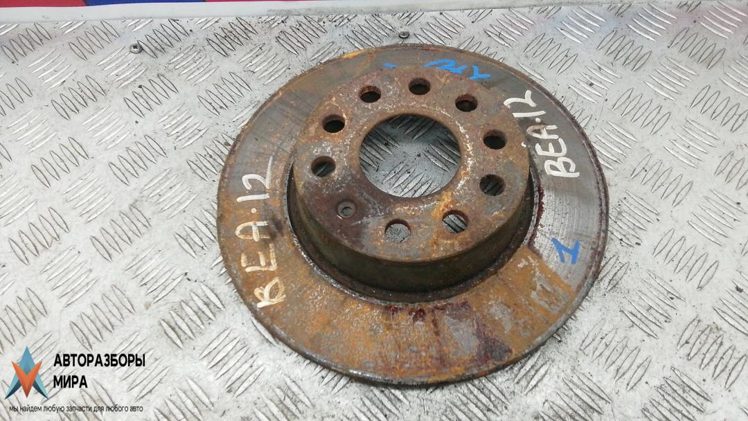 диск тормозной задний Skoda Superb 2 поколение 2010, 1.9 л., D TDI PD, дизель, МКПП, хетчбэк 5 дв. - фото №1