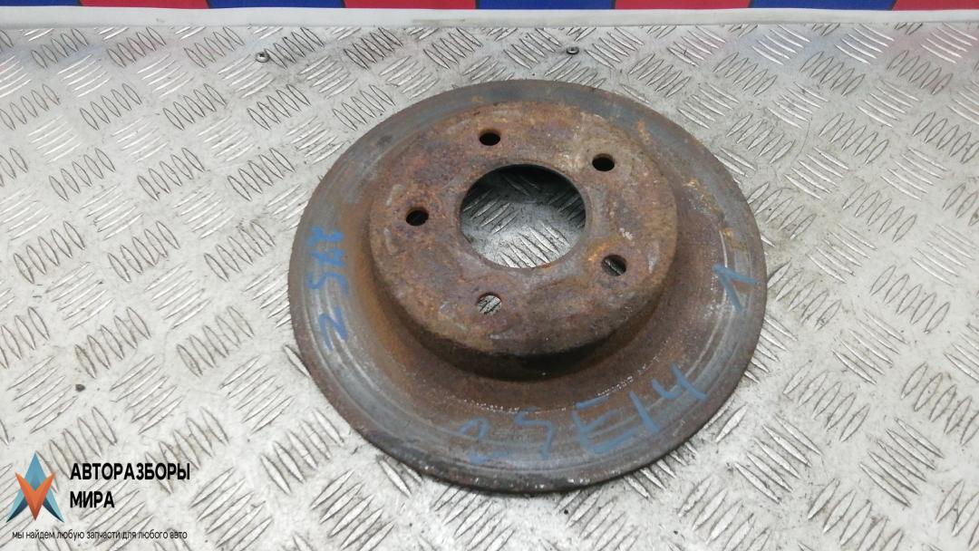 диск тормозной задний Nissan Primera P12 2003, 1.8 л., бензин, МКПП, седан - фото №1