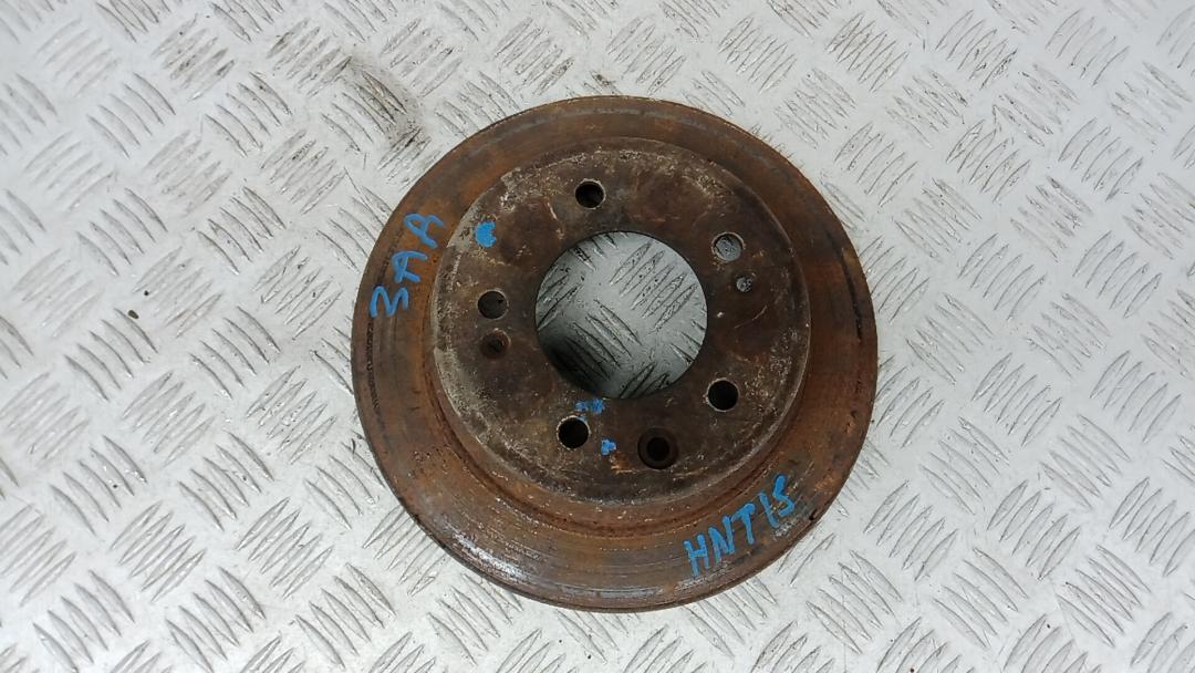 диск тормозной задний Kia Sportage 3 поколение 2012, 1.7 л., дизель, МКПП, внедорожник 5 дв., 584111H100 - фото №1